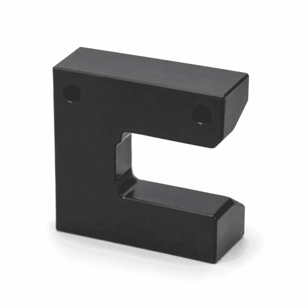 CNC Machined POM Slider Block with open guide profile and mounting holes