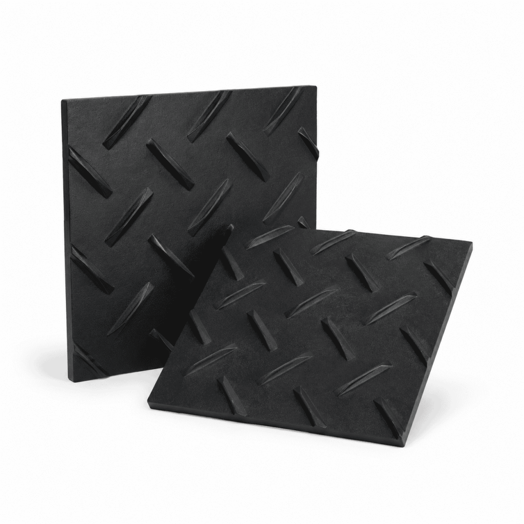 Black plastic temporary heavy duty ground protection mats